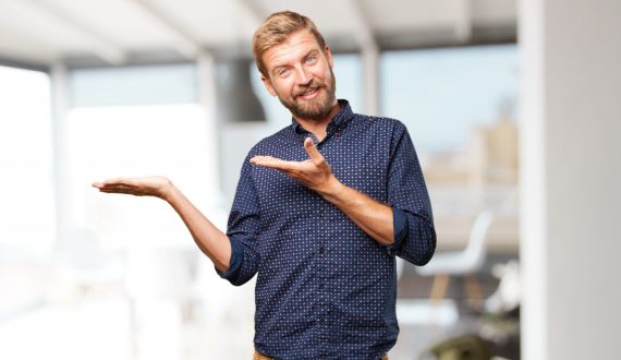blond businessman happy expression